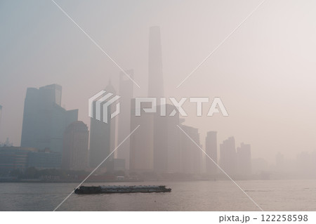 bad Air Pollution in Shanghai City, China. Skyscraper of Lujiazui in Pudong, view from The Bund in the morning. Air Quality Index, AQI, Unhealthy, healthcare concept 122258598