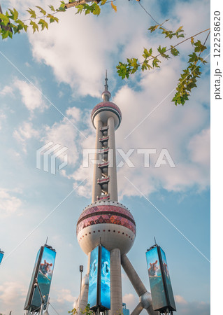 Cityscape view of Shanghai city. Skyscraper of the Oriental Pearl Tower, view from Lujiazui in Pudong of Shanghai, China. landmark and popular for tourism attractions. Travel and Vacation concept Cityscape view of Shanghai city. Skyscraper of the Oriental Pearl Tower, view from Lujiazui in Pudong of Shanghai, China. landmark and popular for tourism attractions. Travel and Vacation concept 122258620