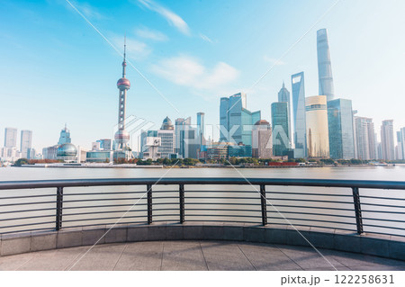 Cityscape view of Shanghai city in the morning. Skyscraper of Lujiazui in Pudong, view from The Bund of Shanghai, China. landmark and popular for tourism attractions. Travel and Vacation concept Cityscape view of Shanghai city in the morning. Skyscraper of Lujiazui in Pudong, view from The Bund of Shanghai, China. landmark and popular for tourism attractions. Travel and Vacation concept 122258631