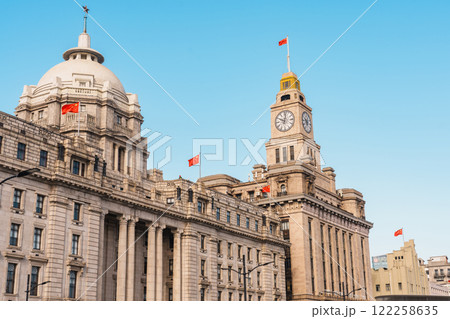 Cityscape view of Shanghai city in the morning. Skyscraper of The Bund, historical district in central Shanghai, China. landmark and popular for tourism attractions. Travel and Vacation concept Cityscape view of Shanghai city in the morning. Skyscraper of The Bund, historical district in central Shanghai, China. landmark and popular for tourism attractions. Travel and Vacation concept 122258635