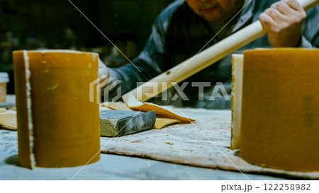 carpenter using nail gun or brad nailer tool on wood box in a workshop ,furniture restoration woodworking concept. selective focus carpenter using nail gun or brad nailer tool on wood box in a workshop ,furniture restoration woodworking concept. selective focus 122258982