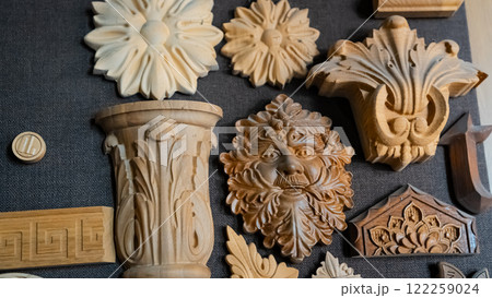 carving element. furniture in classic style. white color wood with gold trim. patina. carving. small depth of field. luxury furniture. use as background. carving element. furniture in classic style. white color wood with gold trim. patina. carving. small depth of field. luxury furniture. use as background. 122259024