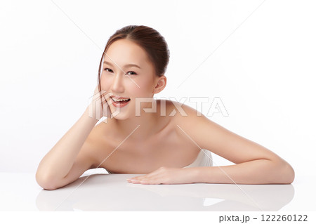 Beautiful young asian woman with clean fresh skin on white background, Face care, Facial treatment, Cosmetology, beauty and spa, Asian women portrait. Beautiful young asian woman with clean fresh skin on white background, Face care, Facial treatment, Cosmetology, beauty and spa, Asian women portrait. 122260122