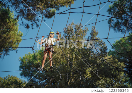 Child in forest adventure park Child in forest adventure park 122260346