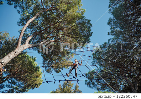 Child in forest adventure park 122260347
