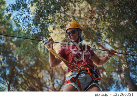 Extreme sport in forest adventure park Extreme sport in forest adventure park 122260351
