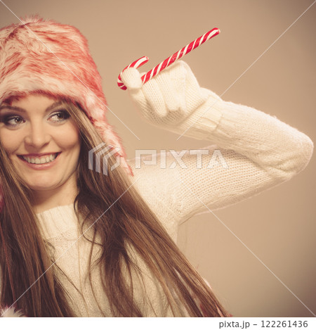 Girl playing with cane. Girl playing with cane. 122261436