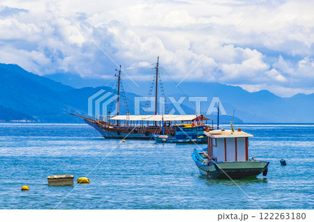 Boats ships and Boat trips Abraao beach Ilha Grande Brazil. 122263180
