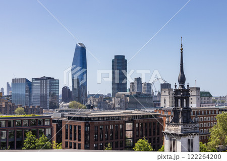 London Skyline with Modern Skyscrapers and Historic Architecture on a Clear Day London Skyline with Modern Skyscrapers and Historic Architecture on a Clear Day 122264200