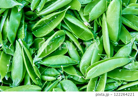 Sweet garden peas without pods, texture of round green field pea seeds. Sweet garden peas without pods, texture of round green field pea seeds. 122264221