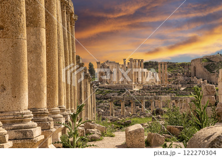 Roman ruins (against the background of a beautiful sky with clouds) in the Jordanian city of Jerash (Gerasa of Antiquity), capital and largest city of Jerash Governorate, Jordan Roman ruins (against the background of a beautiful sky with clouds) in the Jordanian city of Jerash (Gerasa of Antiquity), capital and largest city of Jerash Governorate, Jordan 122270304