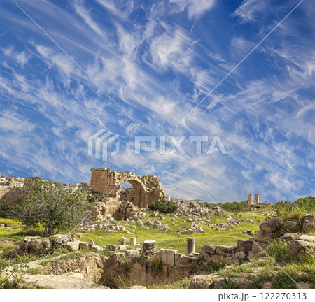 Roman ruins (against the background of a beautiful sky with clouds) in the Jordanian city of Jerash (Gerasa of Antiquity), capital and largest city of Jerash Governorate, Jordan 122270313