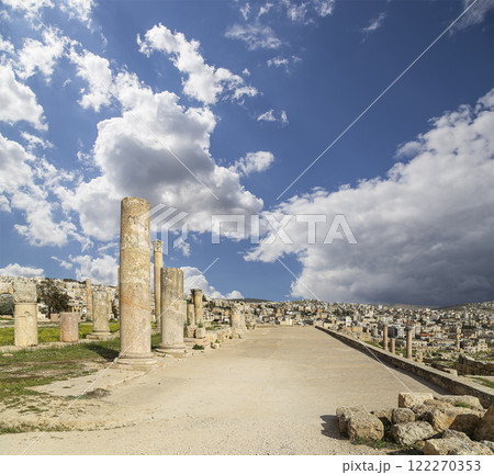 Roman ruins (against the background of a beautiful sky with clouds) in the Jordanian city of Jerash (Gerasa of Antiquity), capital and largest city of Jerash Governorate, Jordan Roman ruins (against the background of a beautiful sky with clouds) in the Jordanian city of Jerash (Gerasa of Antiquity), capital and largest city of Jerash Governorate, Jordan 122270353