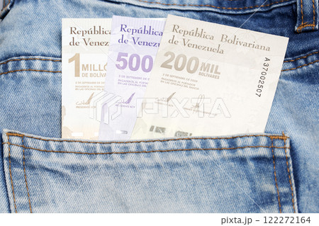 Venezuelan bolivar in the pocket of blue jeans Venezuelan bolivar in the pocket of blue jeans 122272164