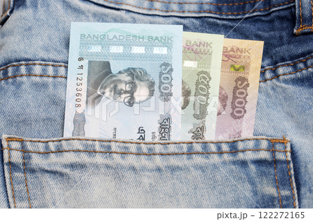 Bangladeshi taka in the pocket of blue jeans Bangladeshi taka in the pocket of blue jeans 122272165