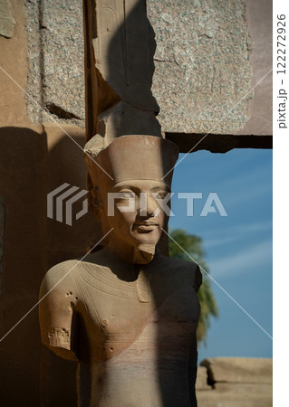 Pharaoh statue near the wall in Luxor Pharaoh statue near the wall in Luxor 122272926