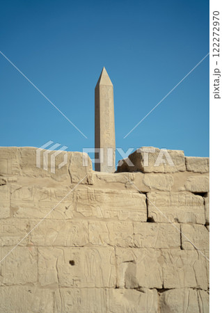Egyptian Ancient Obelisk Behind the Walls of the Ruined Wall 122272970