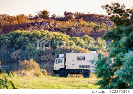 Offroad camper 4x4 truck on nature Offroad camper 4x4 truck on nature 122273898