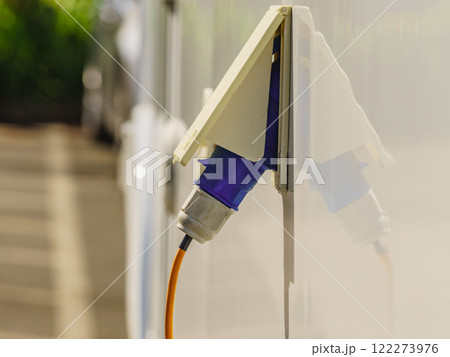 Details of camper vehicle, power socket with cord plug Details of camper vehicle, power socket with cord plug 122273976