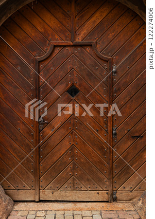 Engraved wooden doors of an old classic door. Antique wooden textures concept.Praha, Czech Republic  122274006