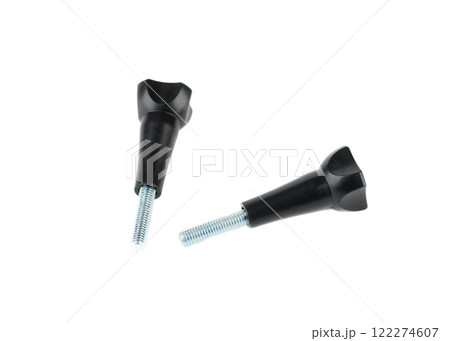Two metal mounting screws in black plastic cases on white background. 122274607