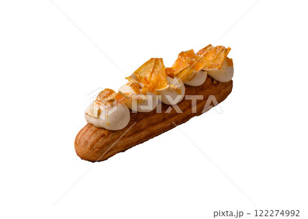 Sweet dessert eclairs or profiteroles with chocolate filling 122274992