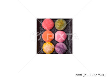 Delicious colorful asian mochi sweets with rice dough shell and fruit filling Delicious colorful asian mochi sweets with rice dough shell and fruit filling 122275018