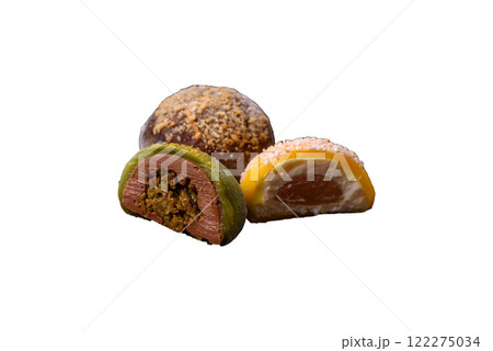 Delicious colorful asian mochi sweets with rice dough shell and fruit filling Delicious colorful asian mochi sweets with rice dough shell and fruit filling 122275034