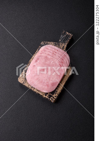 Ham, spam with salt, spices and herbs cut into slices 122275304