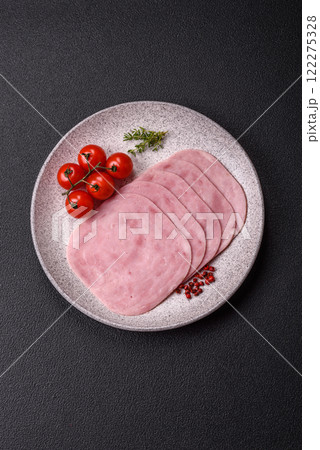 Ham, spam with salt, spices and herbs cut into slices 122275328