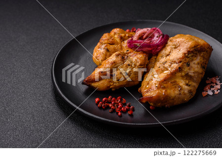 Chicken fillet pieces marinated with salt and spices Chicken fillet pieces marinated with salt and spices 122275669
