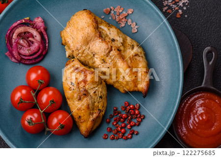 Chicken fillet pieces marinated with salt and spices Chicken fillet pieces marinated with salt and spices 122275685