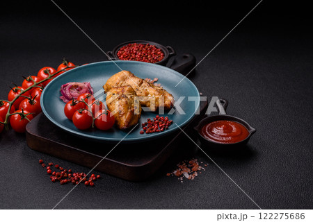 Chicken fillet pieces marinated with salt and spices Chicken fillet pieces marinated with salt and spices 122275686
