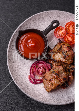 Pieces of beef meat cut into slices, marinated with salt and spices Pieces of beef meat cut into slices, marinated with salt and spices 122275718