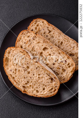 Brown bread with seeds and grains for sandwiches 122275832