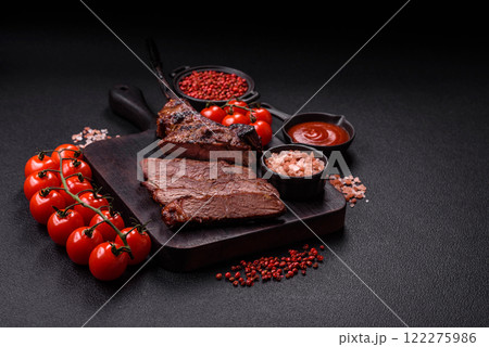 Grilled wagyu beef tomahawk steak with salt, spices and herbs 122275986