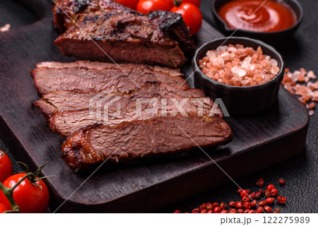 Grilled wagyu beef tomahawk steak with salt, spices and herbs 122275989