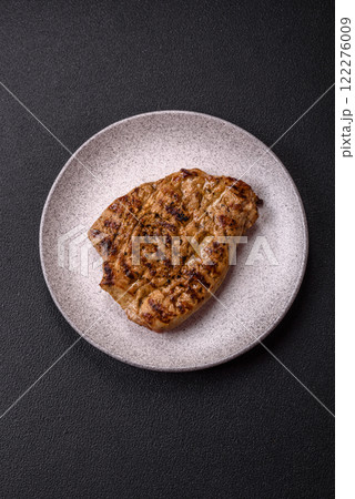 Grilled beef or pork steak with salt, spices and herbs 122276009