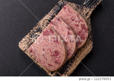 Homemade headcheese with salt, spices, herbs and vegetables Homemade headcheese with salt, spices, herbs and vegetables 122276051