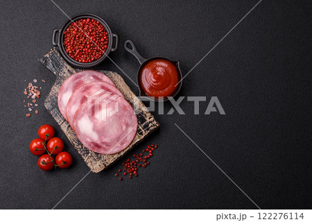 Ham cut into slices with salt and spices Ham cut into slices with salt and spices 122276114