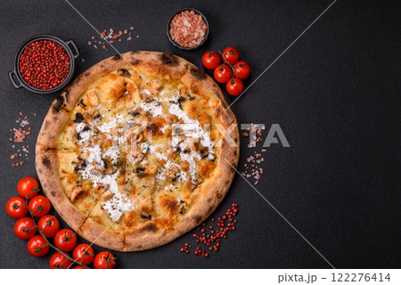 Creamy pizza with truffle cheese, mozzarella, chicken and mushrooms Creamy pizza with truffle cheese, mozzarella, chicken and mushrooms 122276414