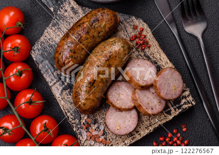 Juicy sausages with salt, spices and herbs 122276567