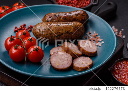 Juicy sausages with salt, spices and herbs Juicy sausages with salt, spices and herbs 122276578