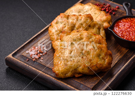 Delicious fried pork or chicken chops with salt and spices Delicious fried pork or chicken chops with salt and spices 122276630