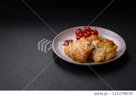 Delicious fried pork or chicken chops with salt and spices Delicious fried pork or chicken chops with salt and spices 122276639