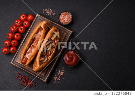 Hotdog with grilled sausage with bacon and mushrooms Hotdog with grilled sausage with bacon and mushrooms 122276848