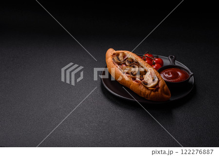 Hotdog with grilled sausage with bacon and mushrooms Hotdog with grilled sausage with bacon and mushrooms 122276887