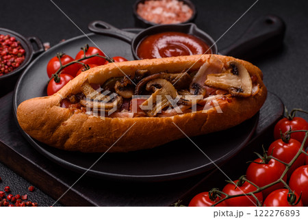Hotdog with grilled sausage with bacon and mushrooms 122276893
