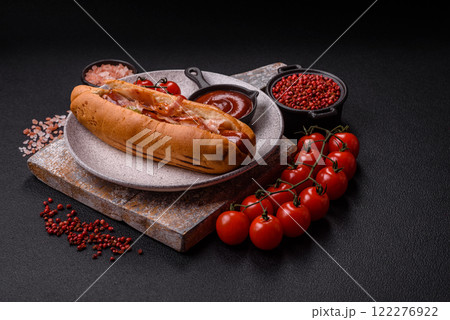 Hotdog with grilled sausage with bacon and mushrooms Hotdog with grilled sausage with bacon and mushrooms 122276922