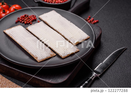 Rectangular whole grain crisp bread with cream cheese 122277288
